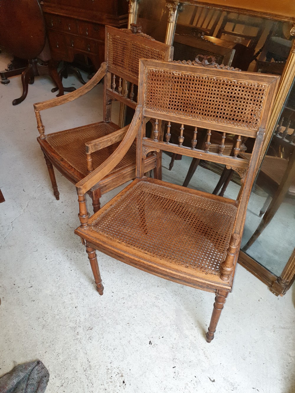Pair of caned bergere armchairs  View V