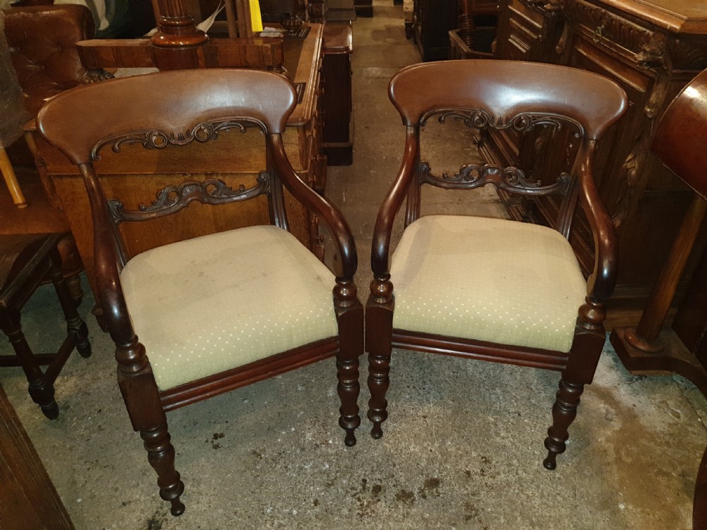 Pair of 19th century mahogany desk armchairs 