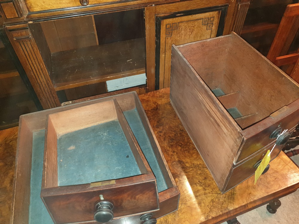 A nineteenth-century Regency mahogany bow-fronted sideboard featuring five drawers with turned wooden knobs and four turned legs. View XI