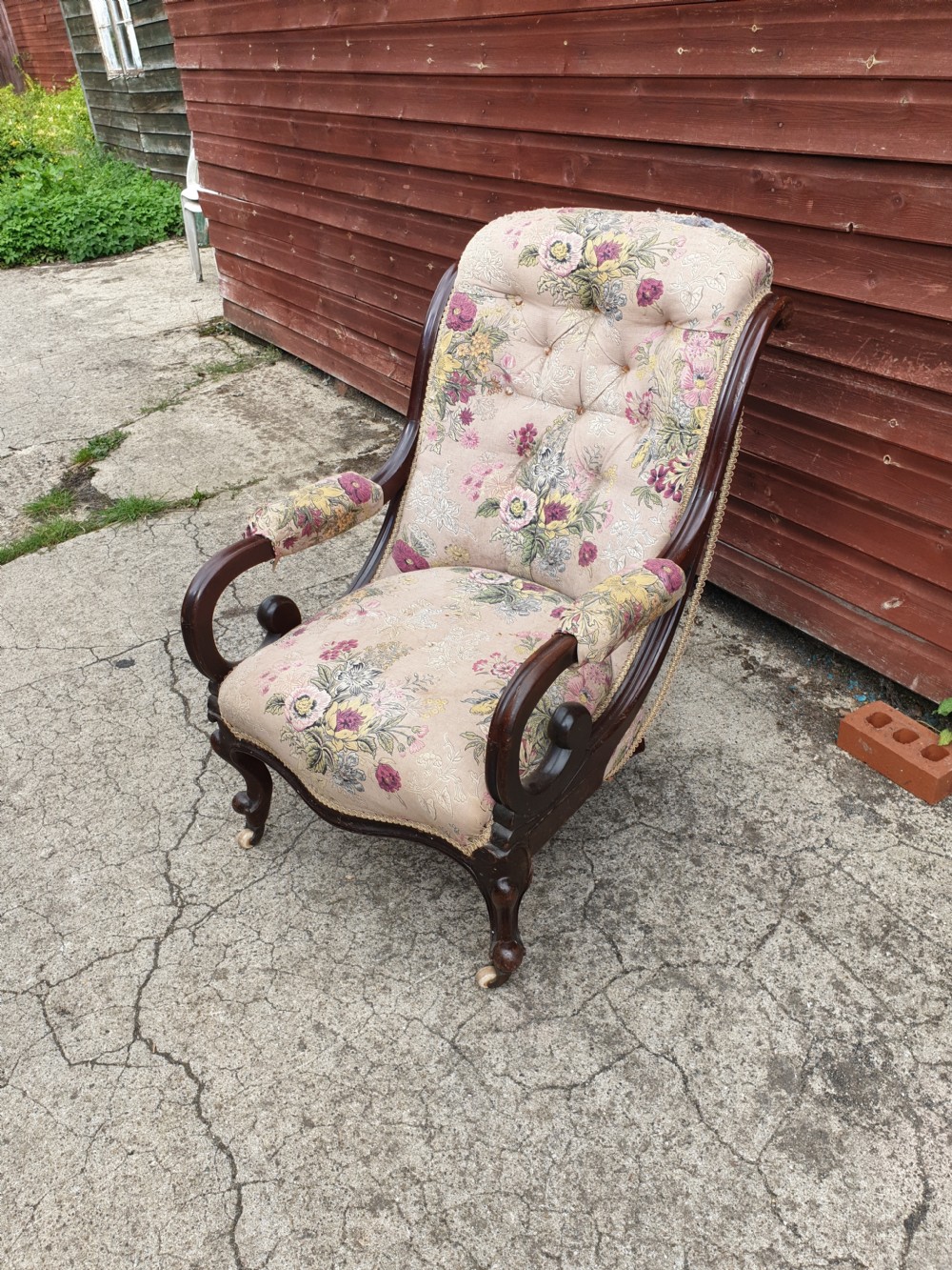 Early Victorian mahogany scroll arm upholstered armchair 