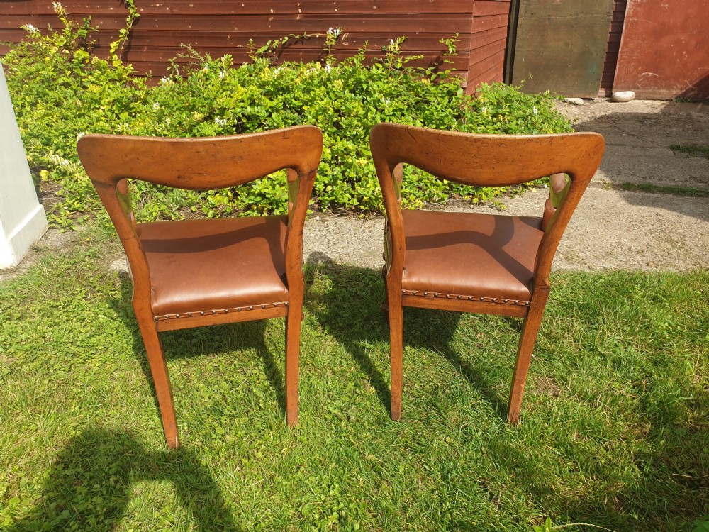 Pair of early Victorian mahogany desk armchairs View II