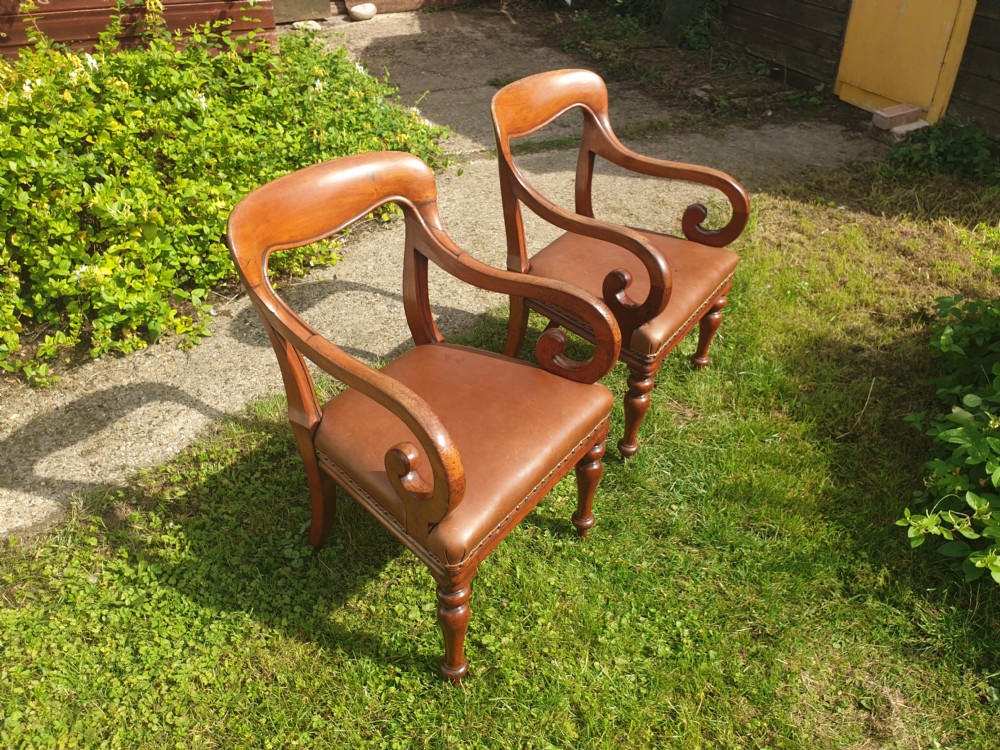 Pair of early Victorian mahogany desk armchairs View V
