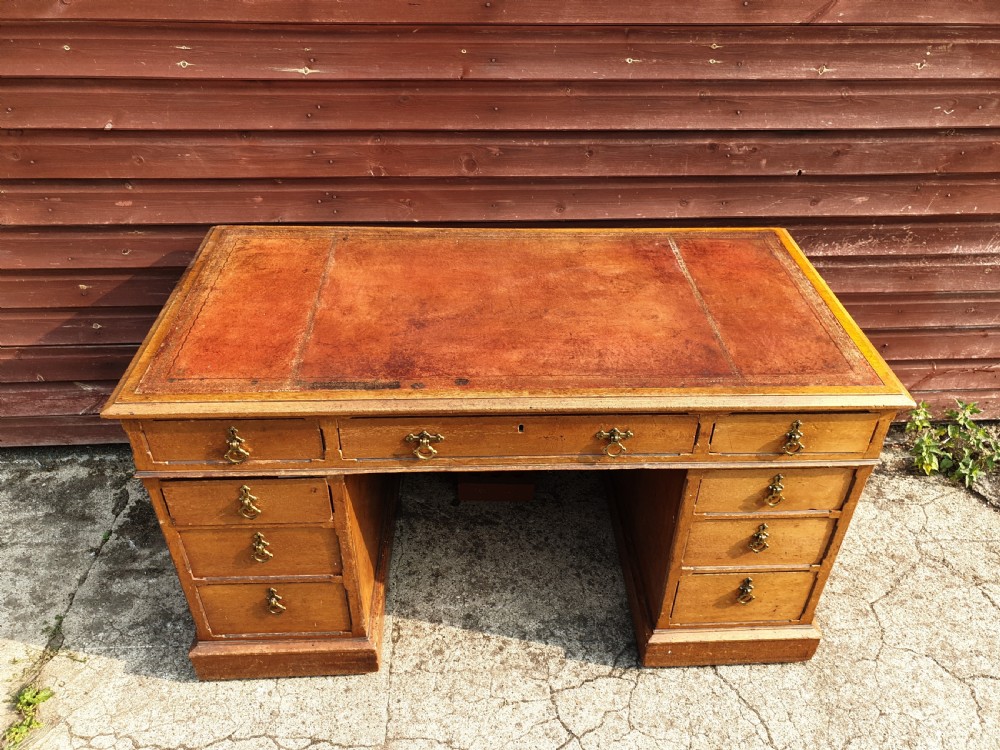 Late Victorian oak kneehole pedestal desk.  View II