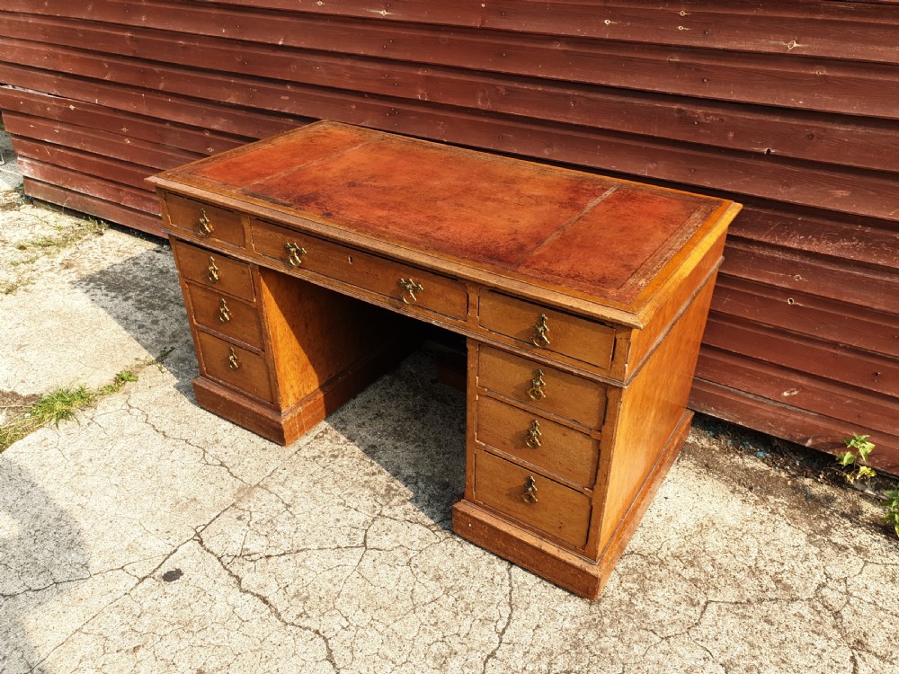 Late Victorian oak kneehole pedestal desk.  View IV