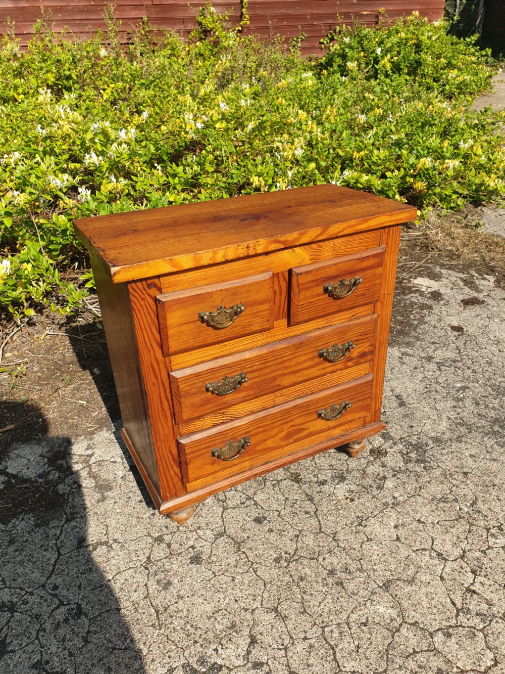 Late Victorian miniature pitch pine chest of drawers  View II