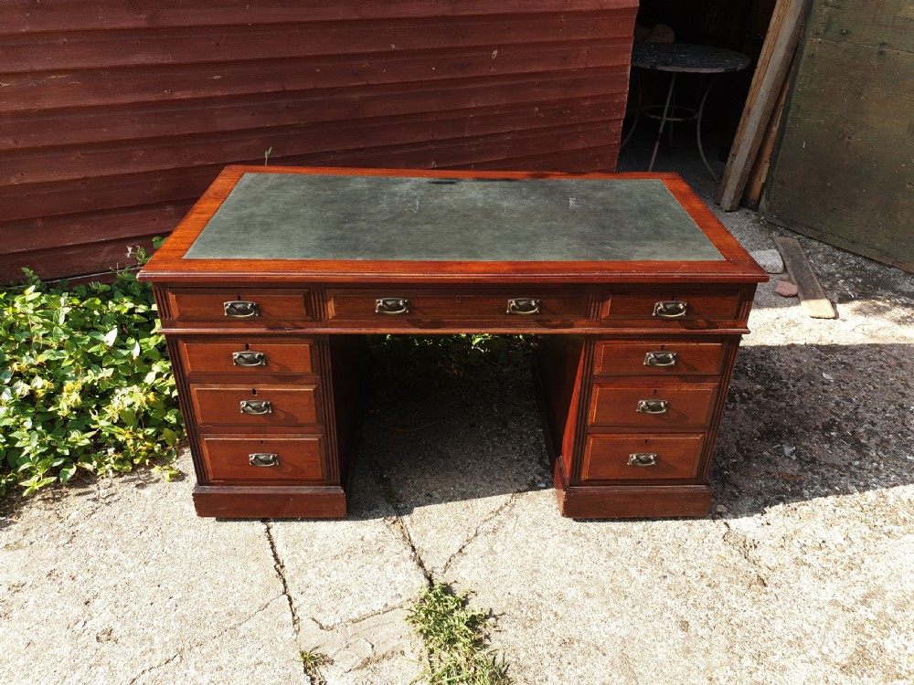 Late Victorian mahogany kneehole pedestal desk  View II