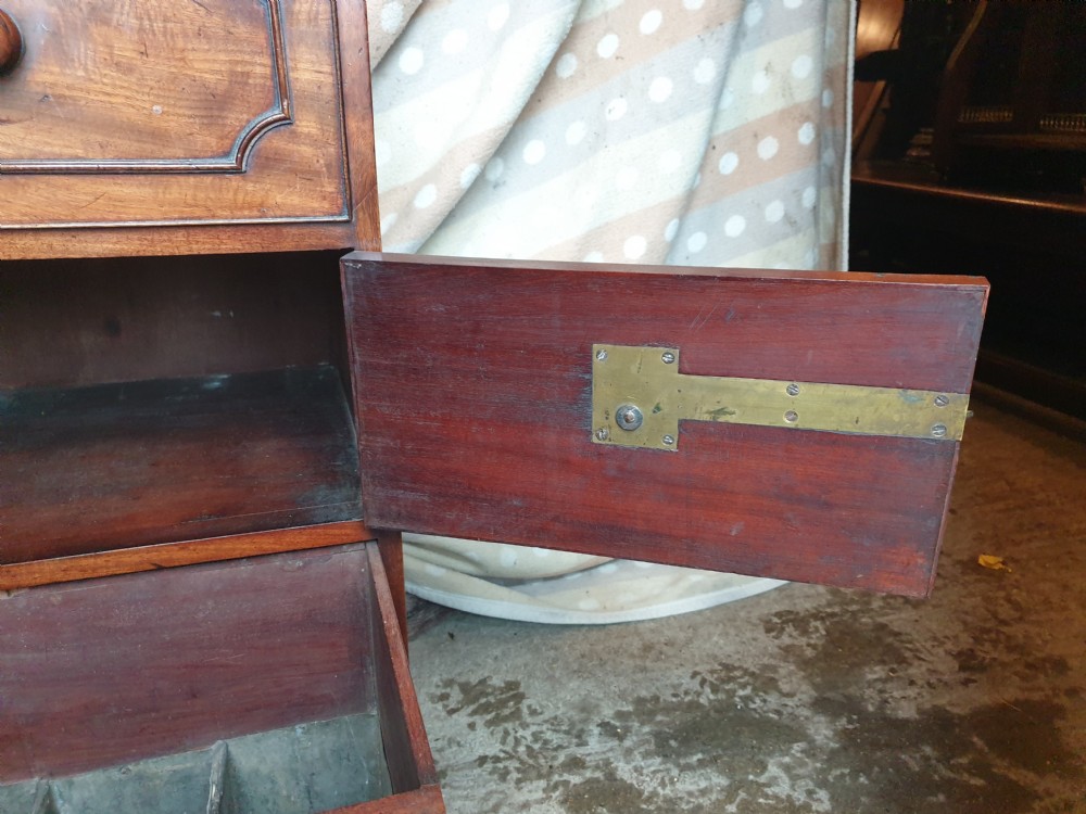 An early nineteenth-century mahogany cabinet-style wine cooler featuring a removable metal-lined top box, drawers with internal bottle dividers, moulded panels, turned wooden knobs, and a hinged side door. View III