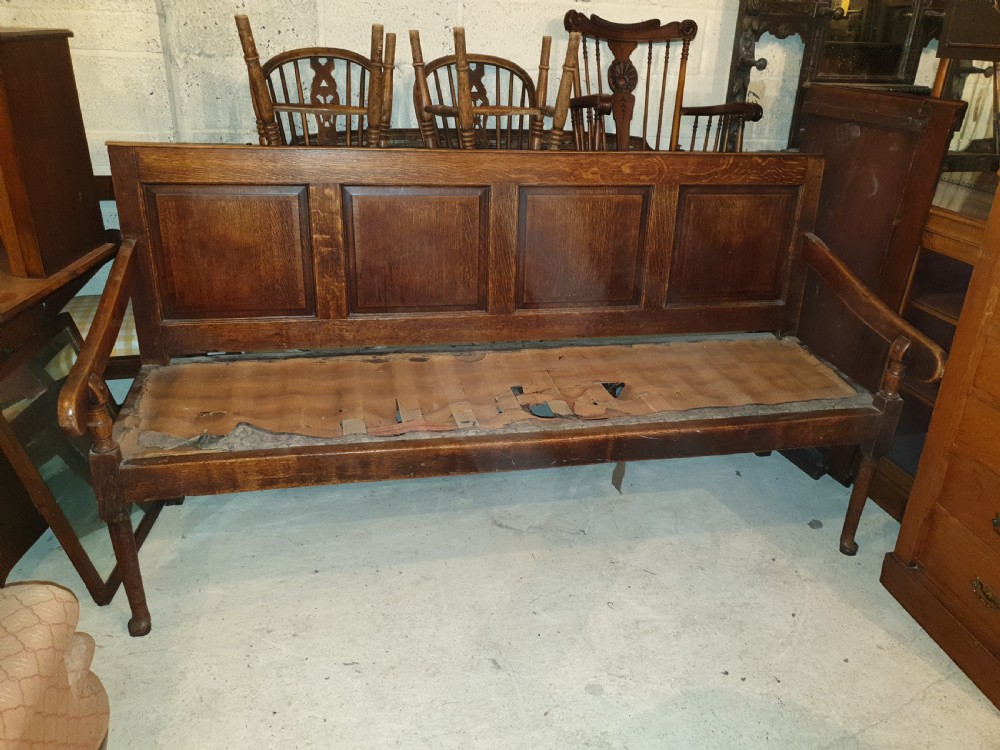 Late Georgian crossbanded oak panelled hall seat
