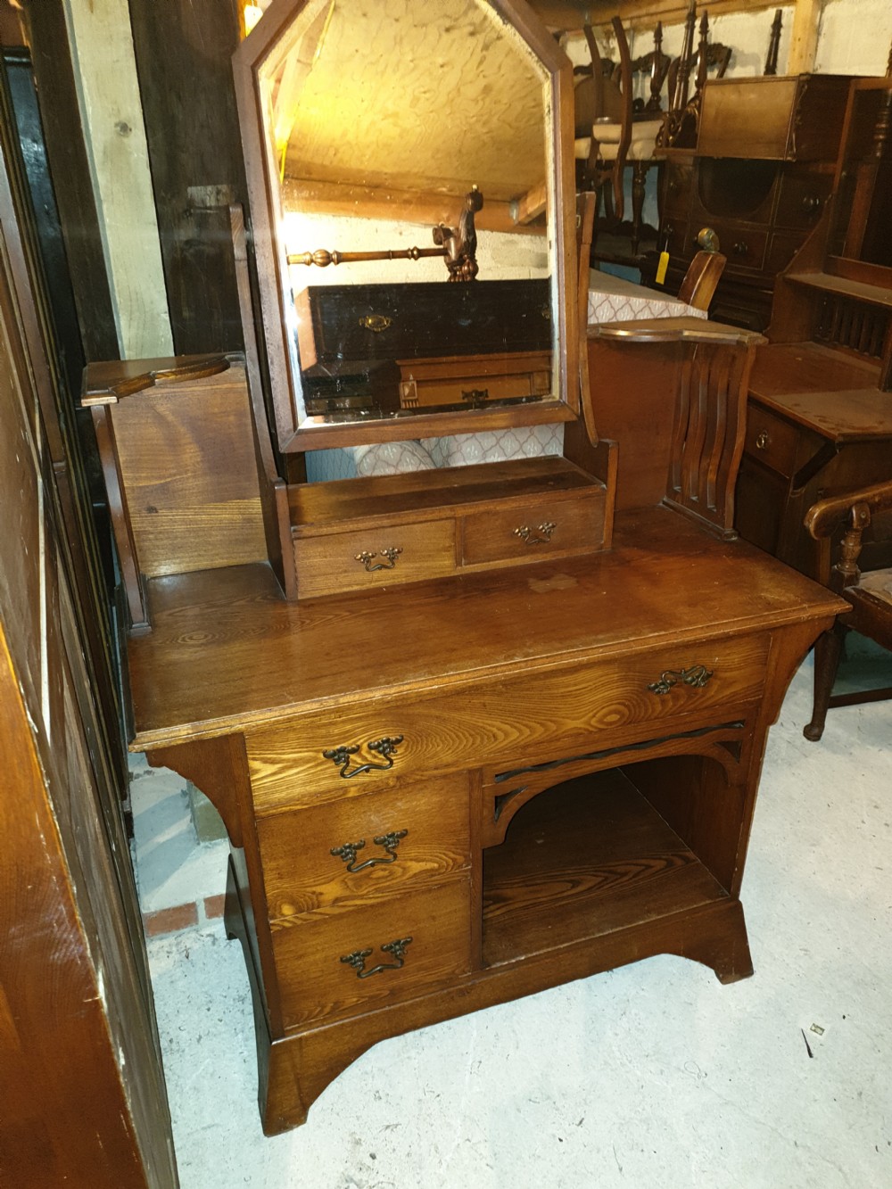 An Arts and Crafts ash bedroom suite featuring a multi-functional compactum wardrobe with leaded glass, a dressing table with mirror, and a tiled washstand with marble surface. View XII