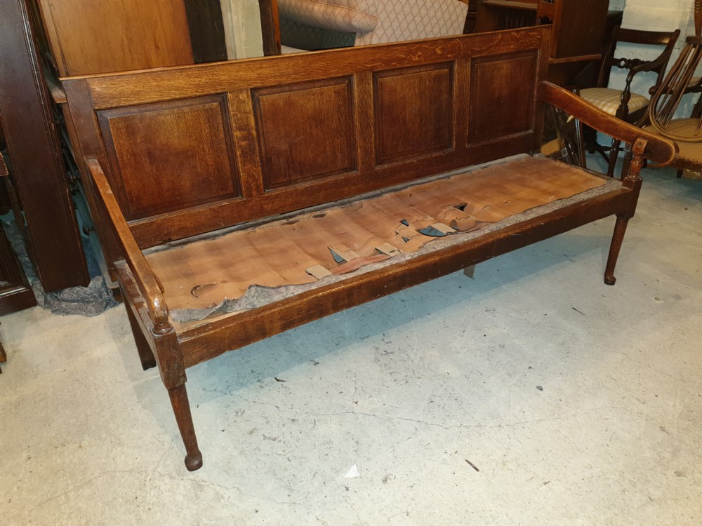 Late Georgian crossbanded oak panelled hall seat View II