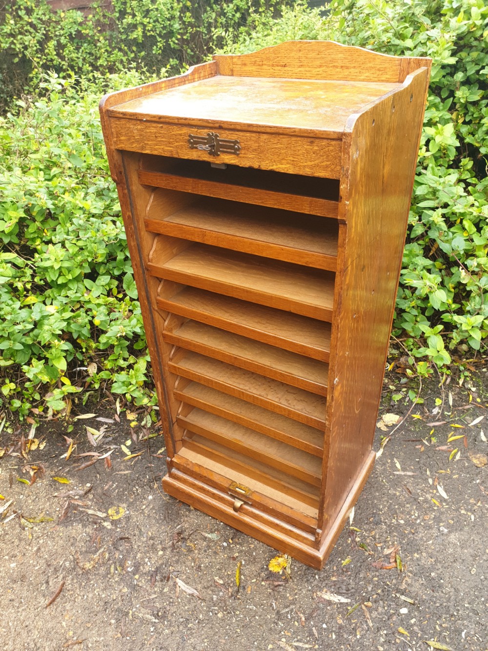 Early 20th century oak tambour front cabinet.  View V