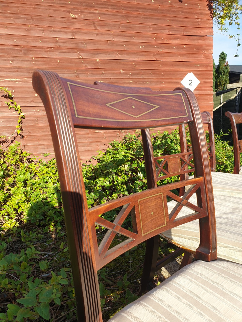 Set of 4 good quality brass inlaid Regency mahogany chairs View V
