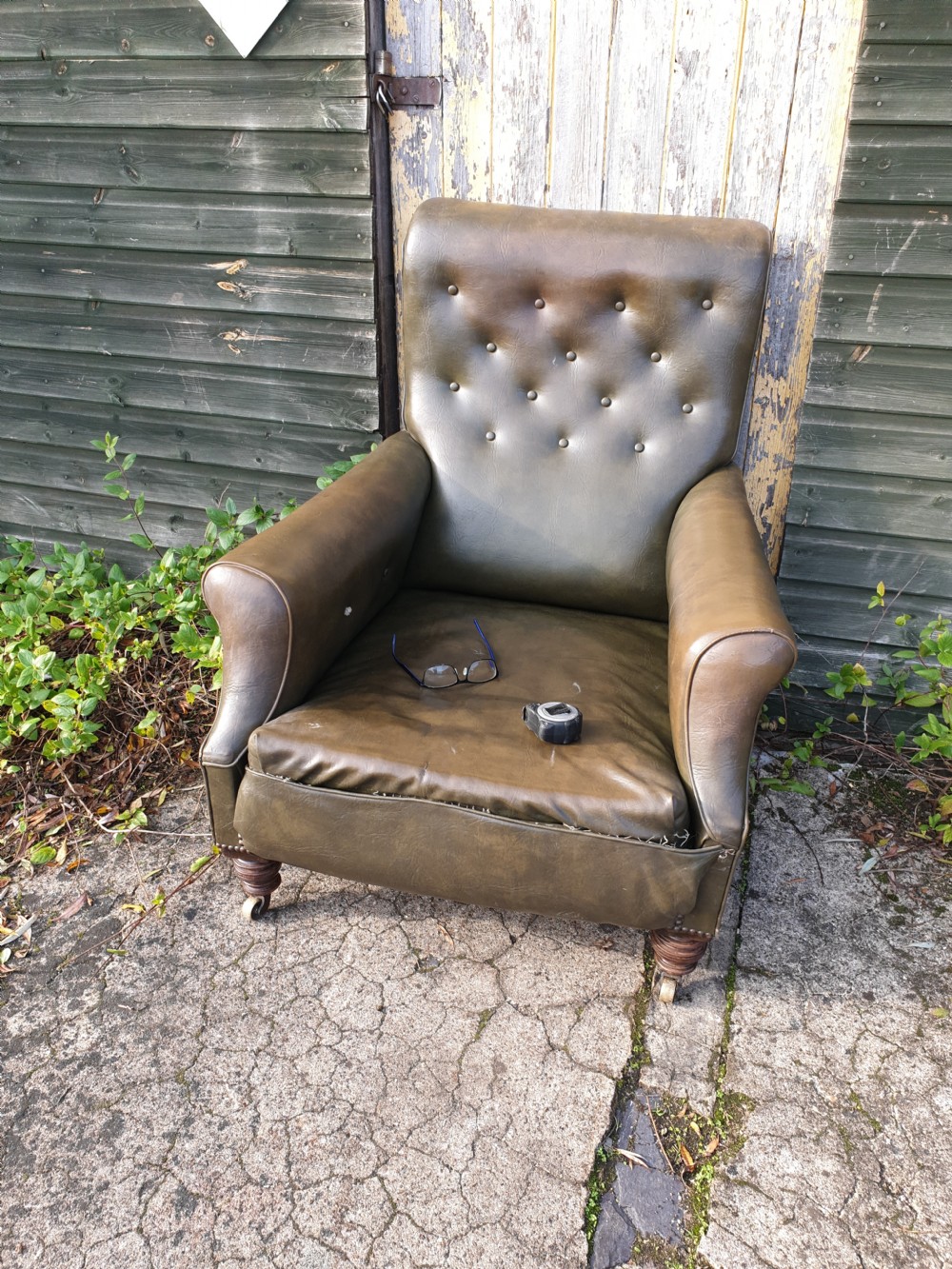 Late Victorian deep seat upholstered armchair 