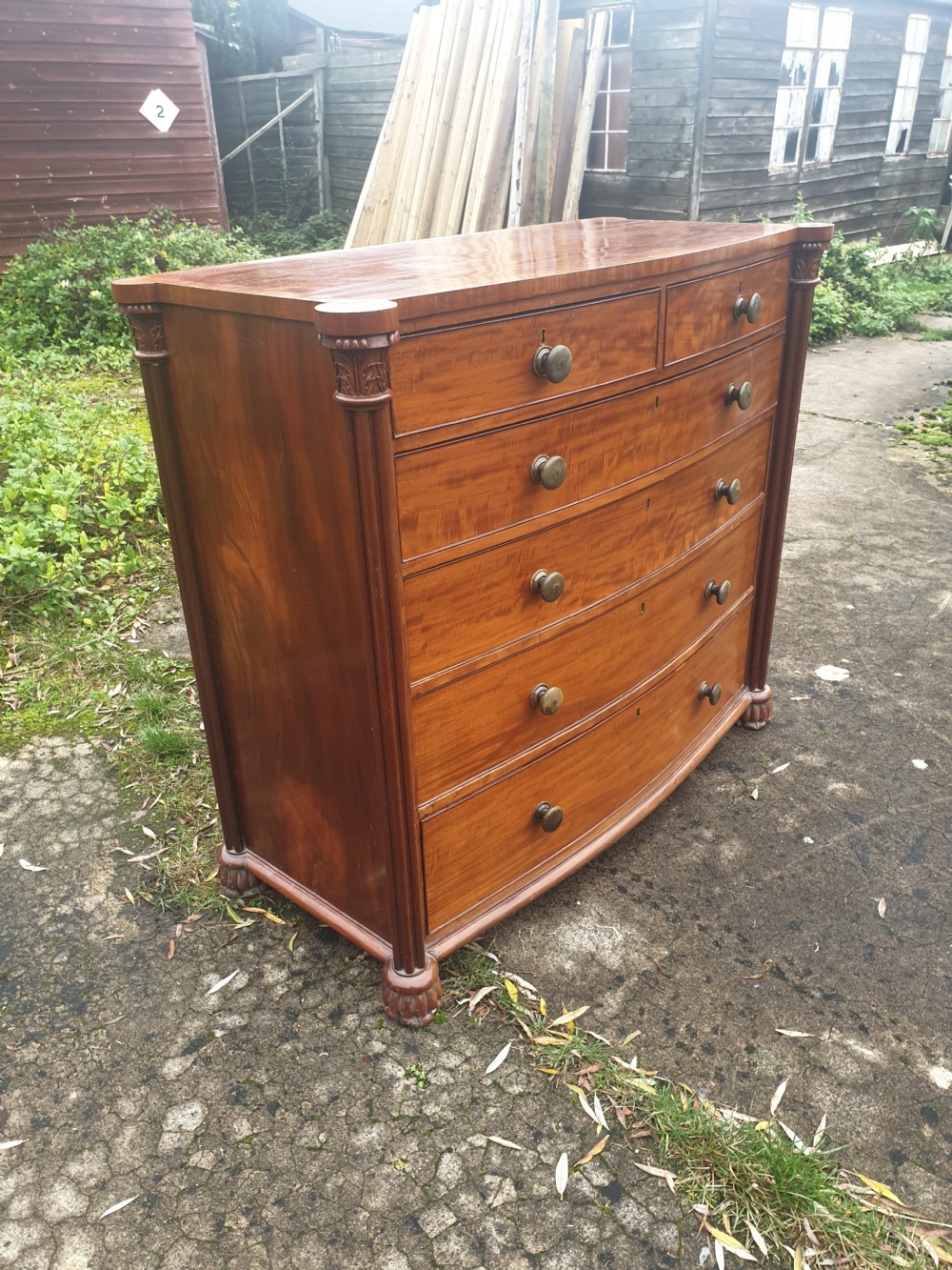 Large Victorian mahogany chest with inlaid horn handles.  View II