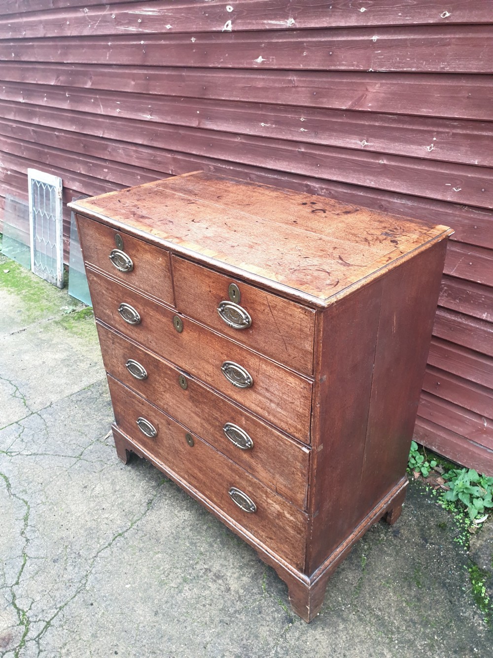 Late Georgian oak chest of drawers.  View II