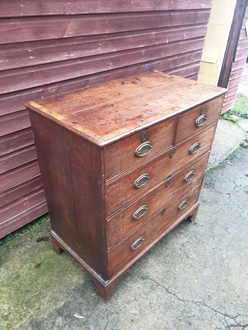 Late Georgian oak chest of drawers.  View III