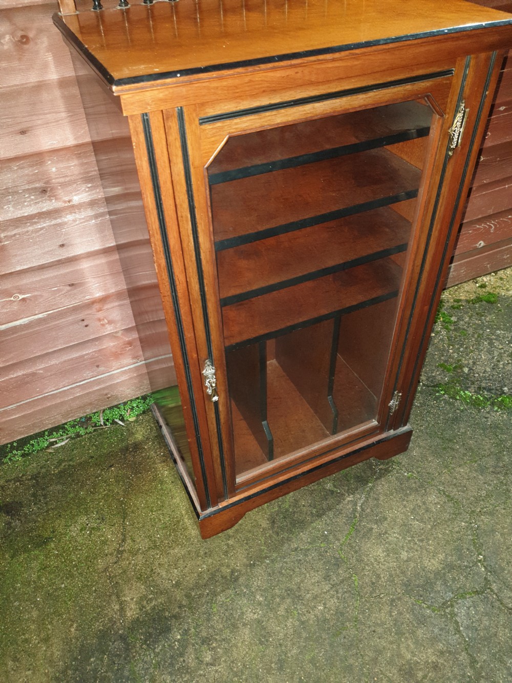 Good quality walnut and ebonised banded music cabinet.  View IV