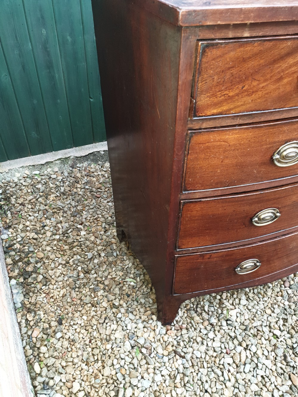 Late Georgian mahogany bow front chest. View III