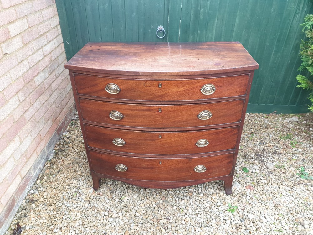 Late Georgian mahogany bow front chest. View VI