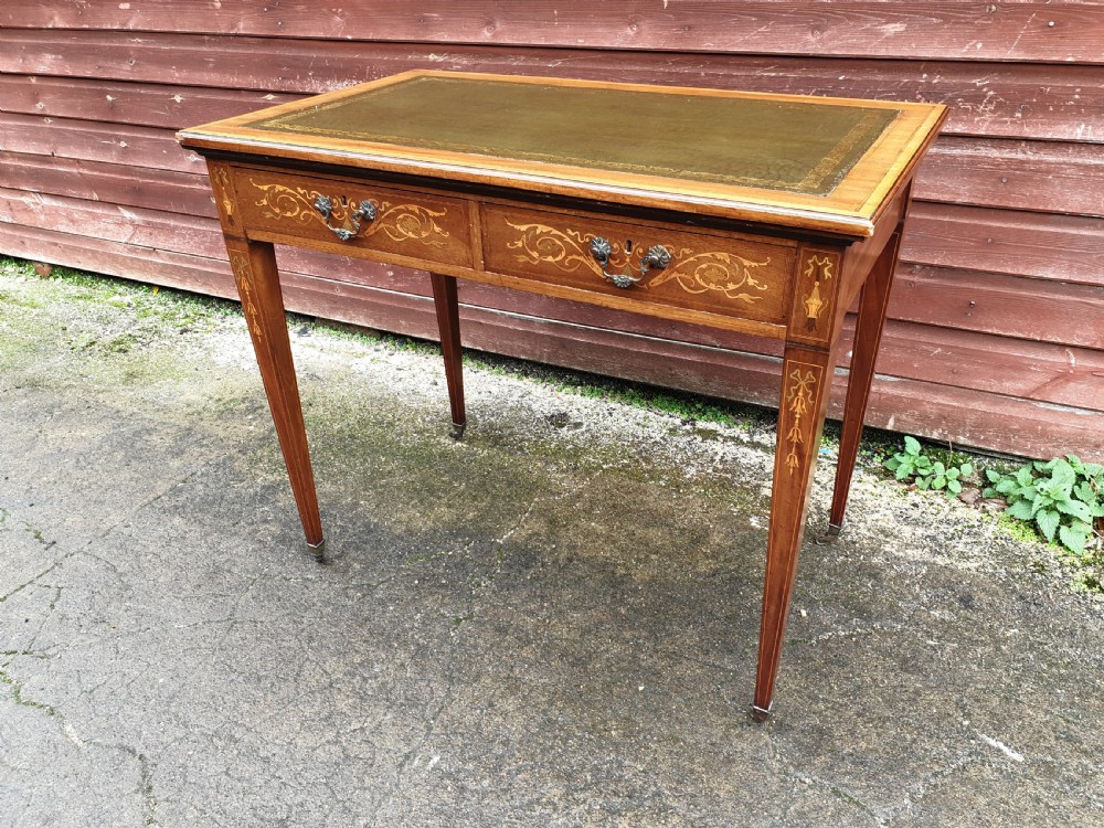 Edwardian inlaid mahogany writing table. 