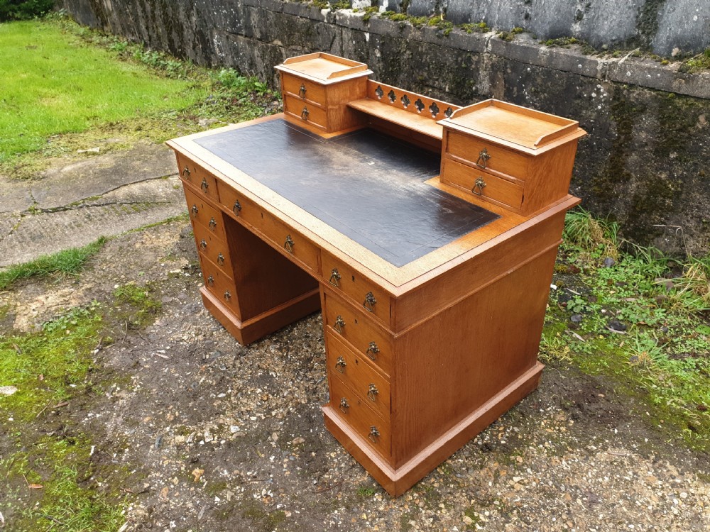 Late Victorian light oak kneehole pedestal desk.  View III
