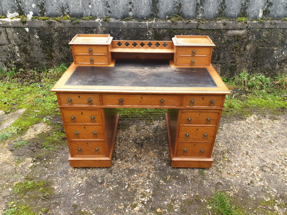 Late Victorian light oak kneehole pedestal desk.  View VI