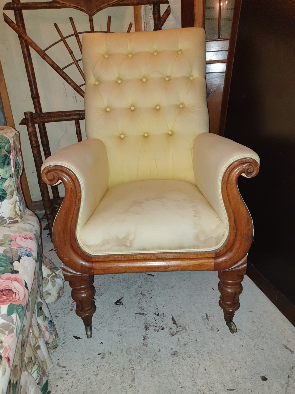 Early Victorian mahogany frame library armchair 