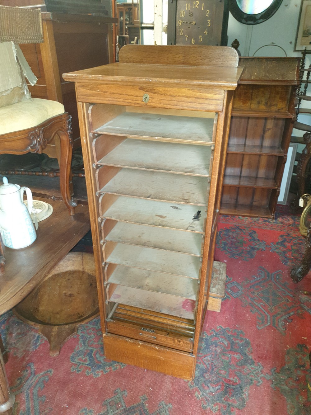 Early 20th century oak tambour front office cabinet.  View III