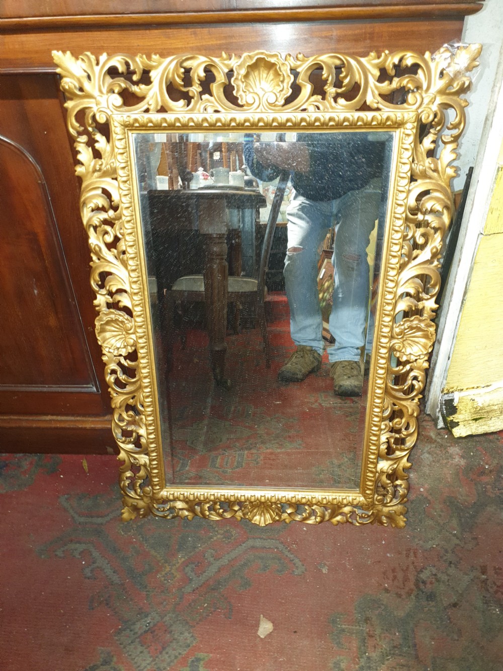 Ornate carved wall mirror 