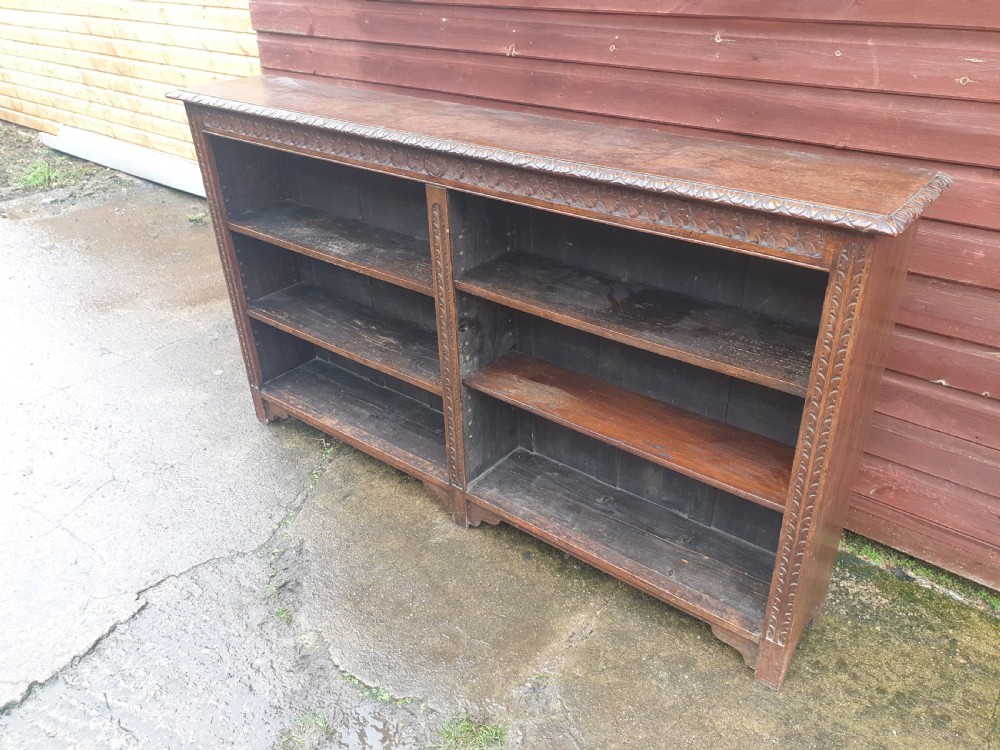 Useful late Victorian carved oak bookcase  View II