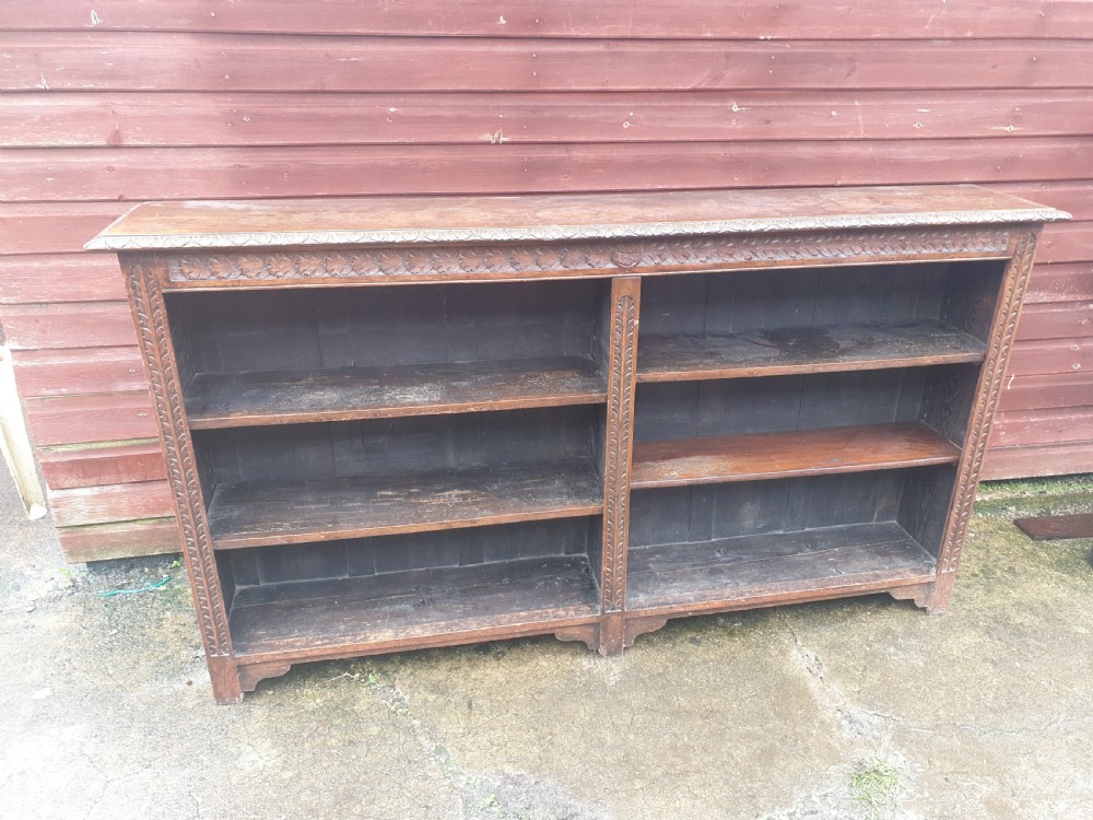 Useful late Victorian carved oak bookcase  View IV