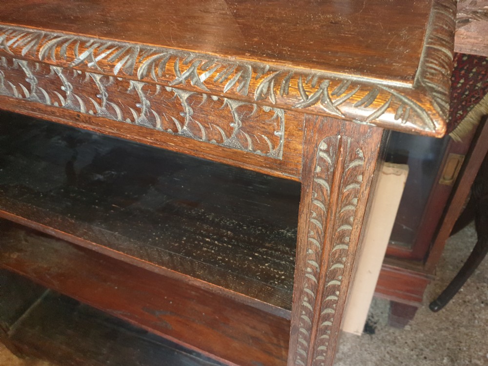 Useful late Victorian carved oak bookcase  View V