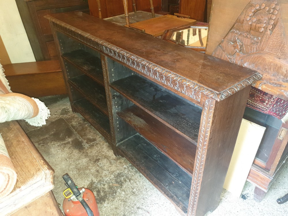 Useful late Victorian carved oak bookcase  View VI