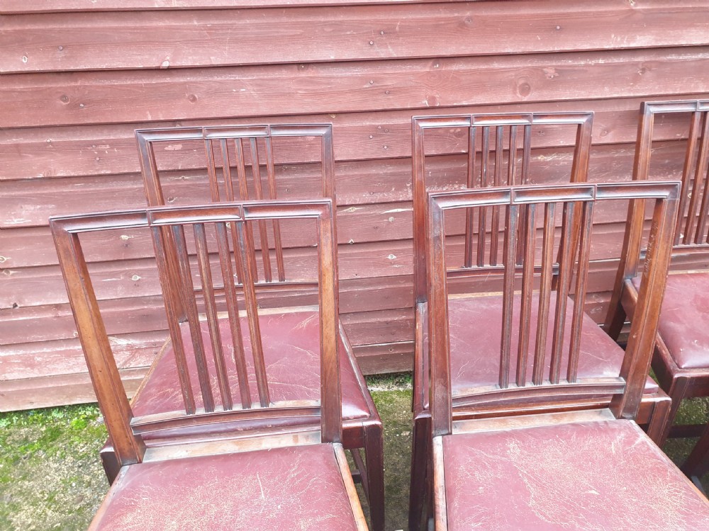 Set of 8 mahogany dining chairs with leather seats. View III