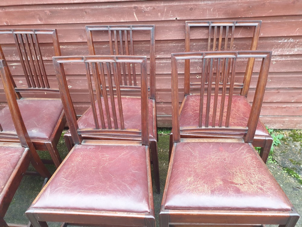 Set of 8 mahogany dining chairs with leather seats. View IV