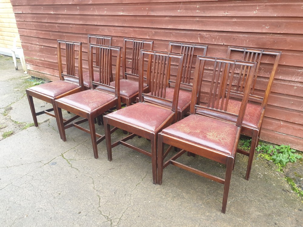 Set of 8 mahogany dining chairs with leather seats. View V
