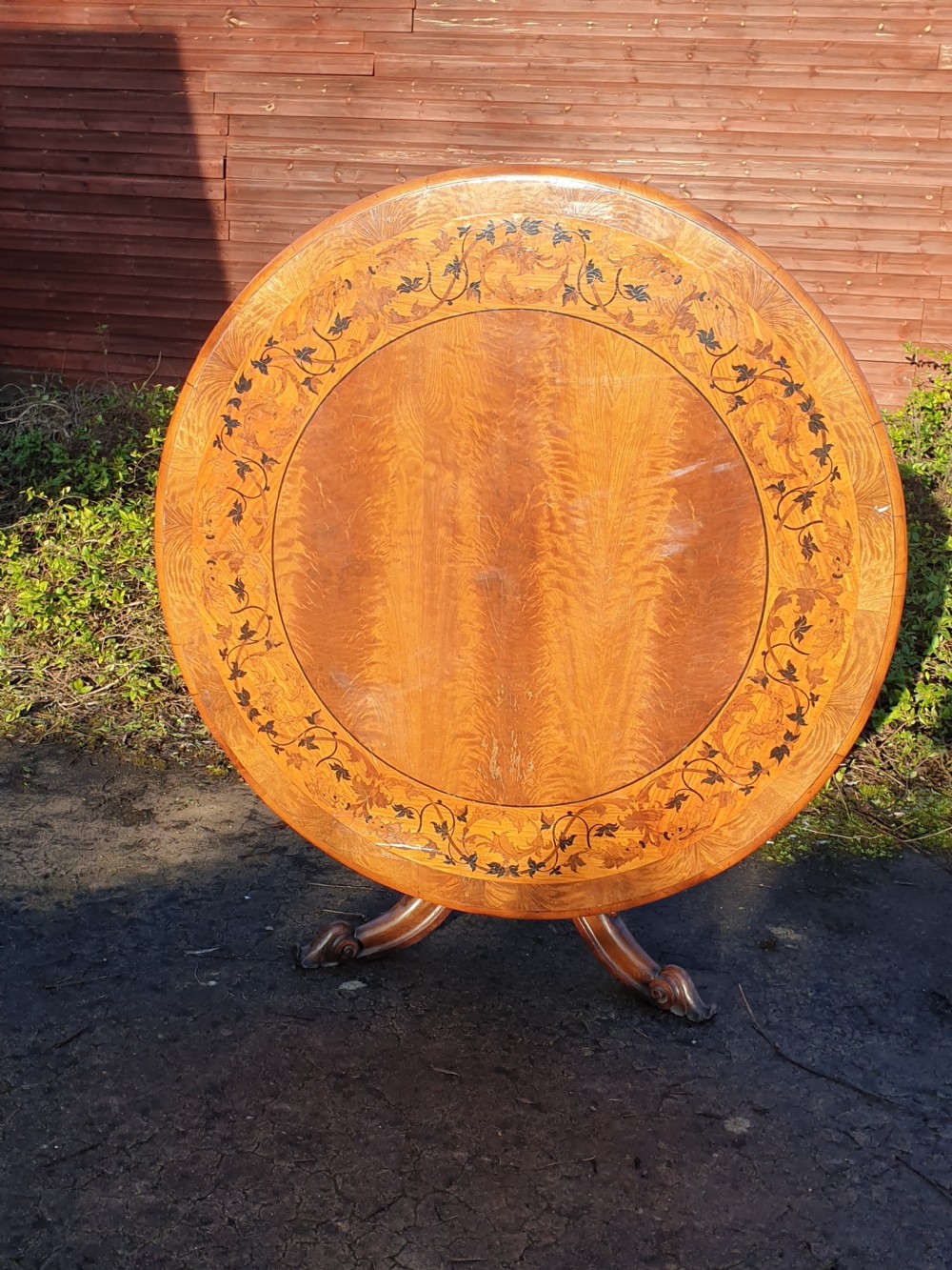 Early Victorian inlaid tip top pedestal table. 