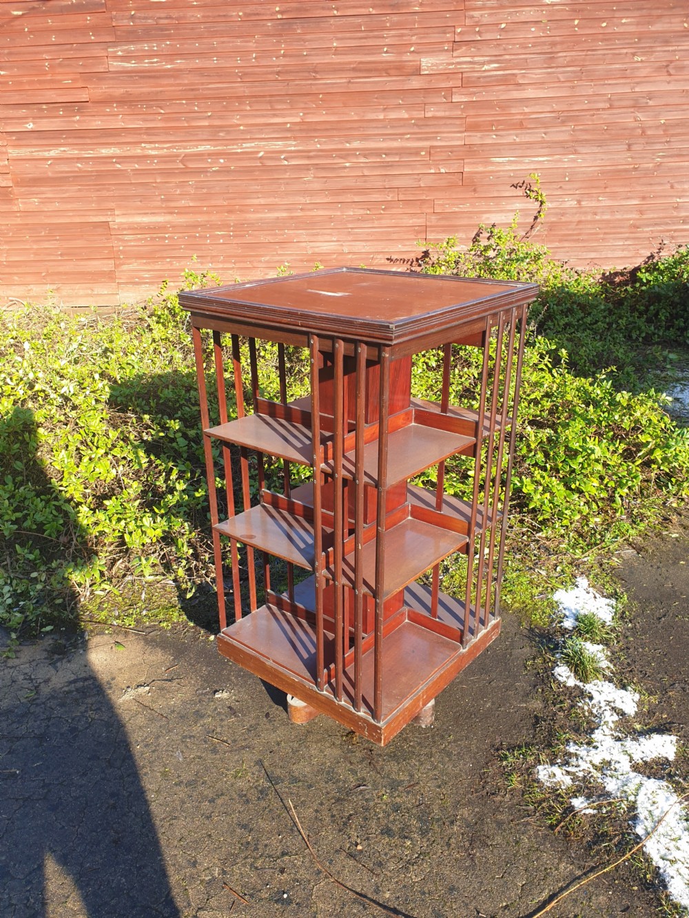 Late Victorian revolving bookcase. Makers label.