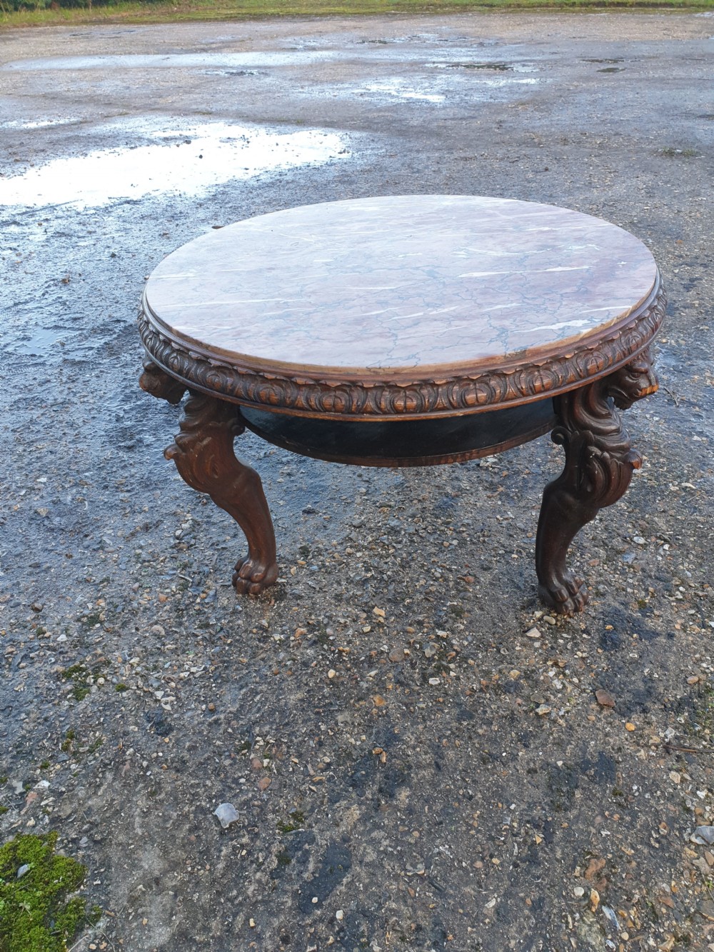 Late 19th century carved oak marble top table. 