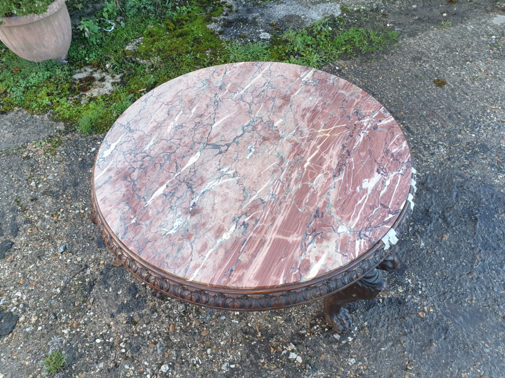 Late 19th century carved oak marble top table.  View II