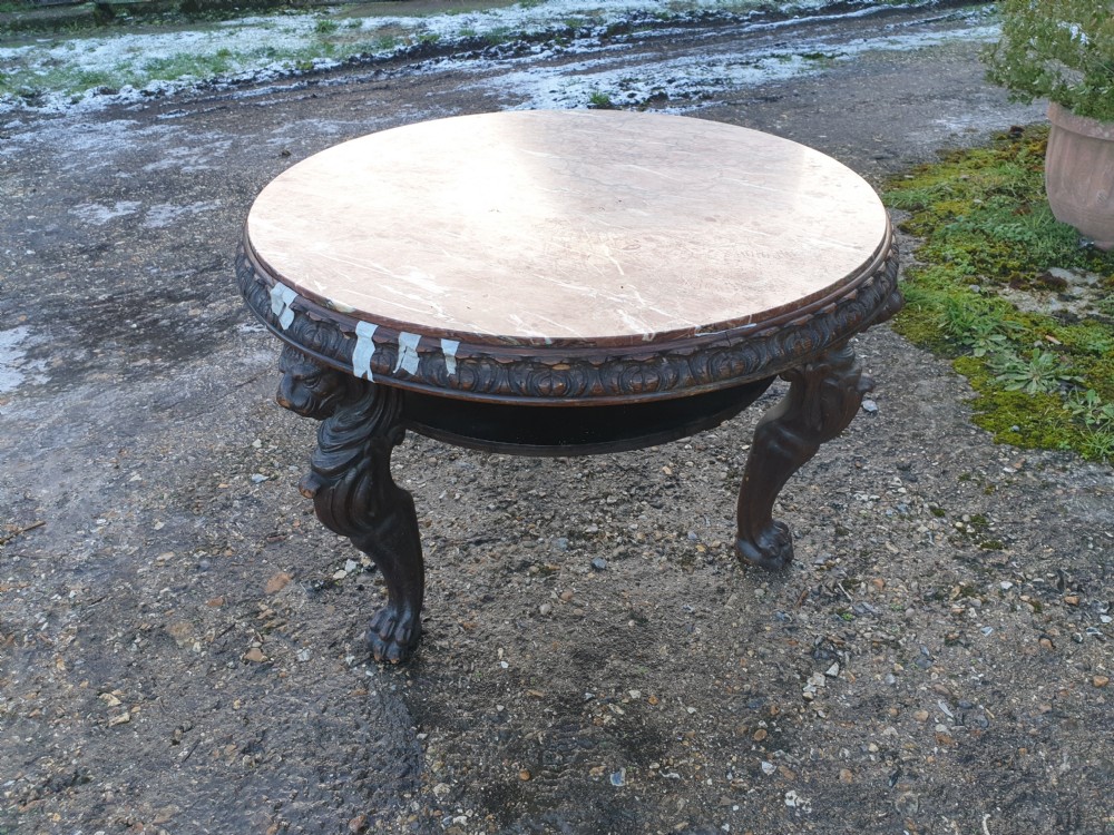 Late 19th century carved oak marble top table.  View VI