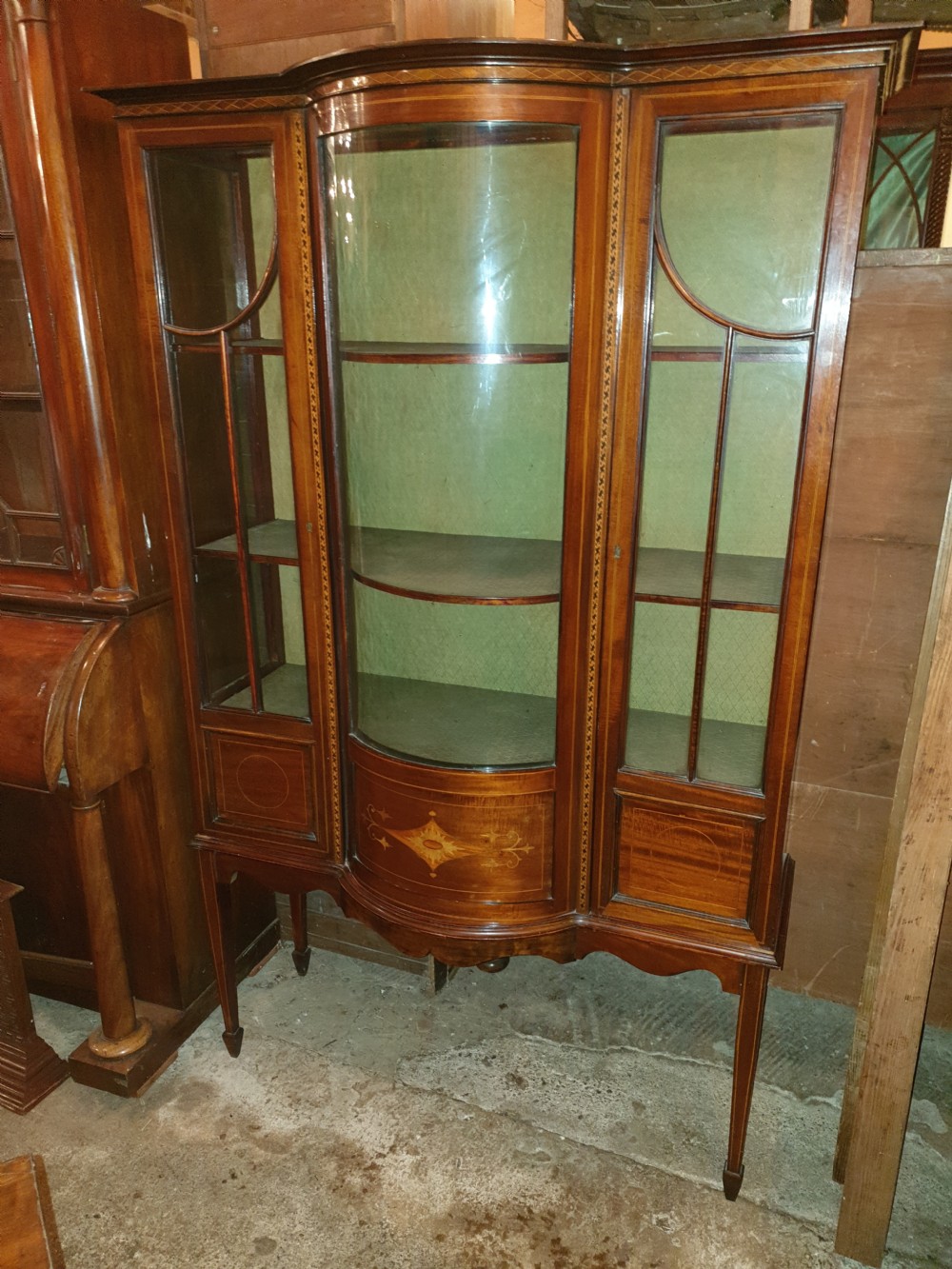 Edwardian inlaid mahogany bow front display cabinet.  View VI