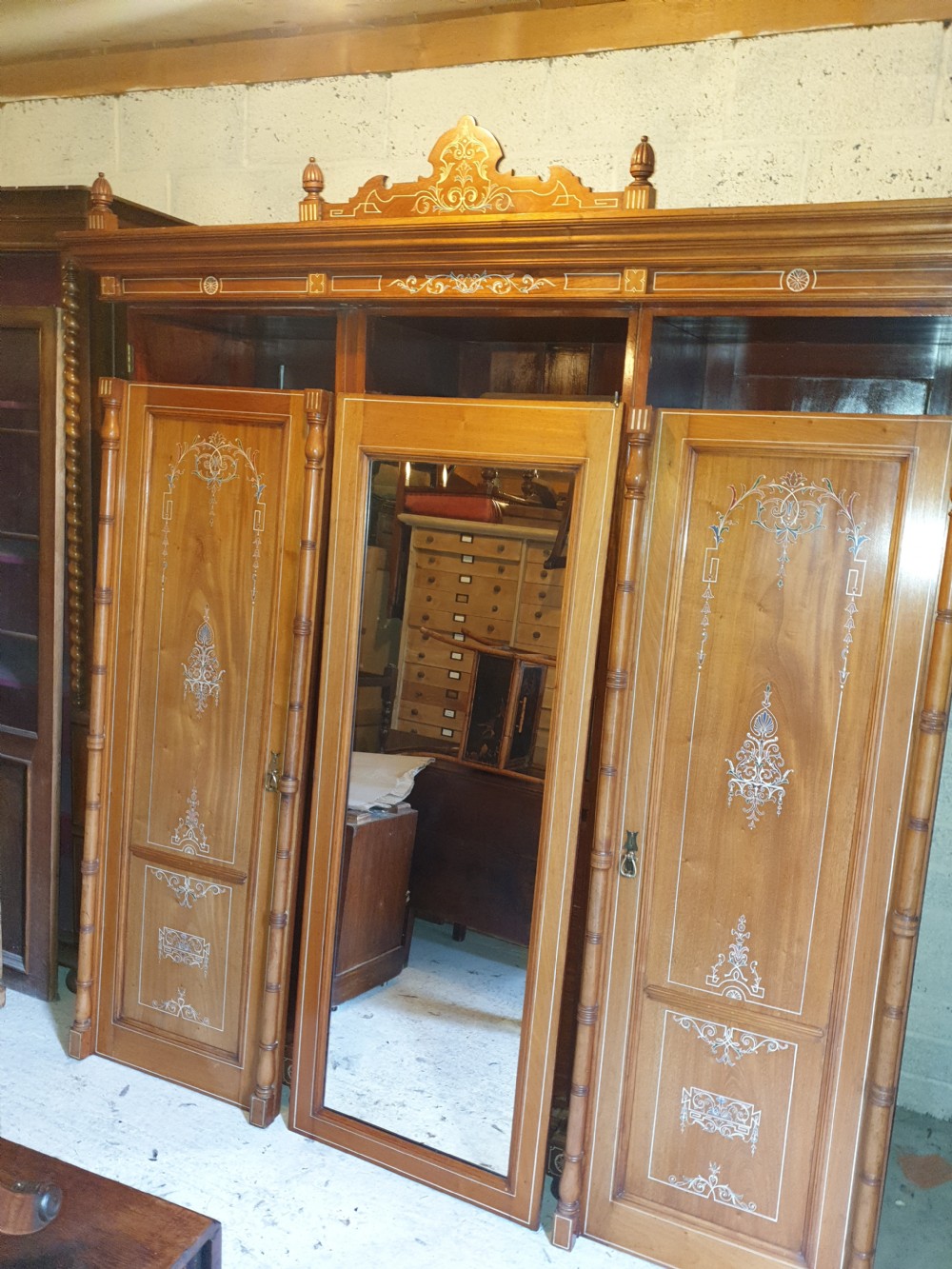 Good quality triple wardrobe with original decoration  View VII