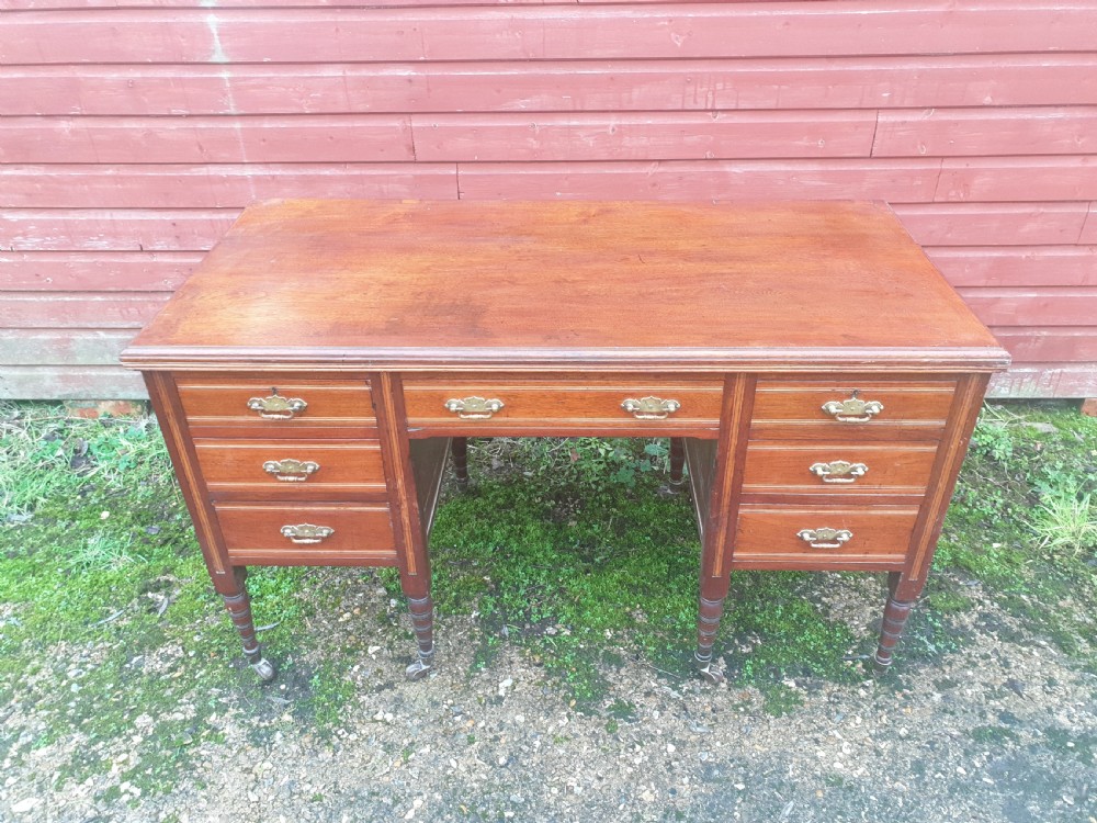 Late Victorian walnut kneehole writing desk. 