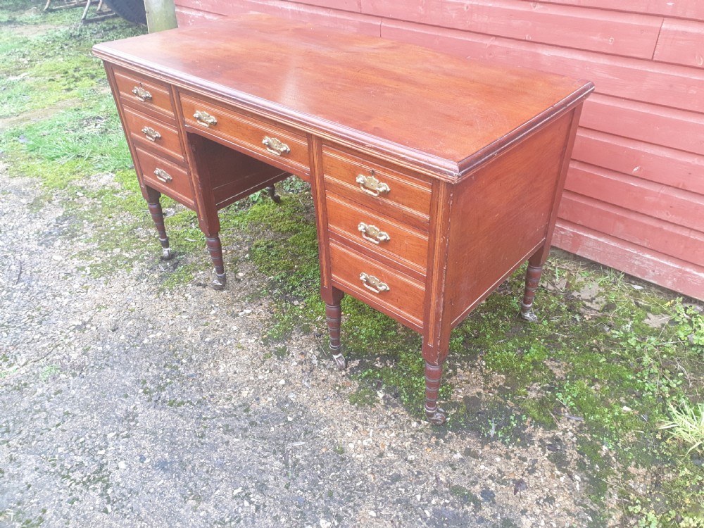 Late Victorian walnut kneehole writing desk.  View II