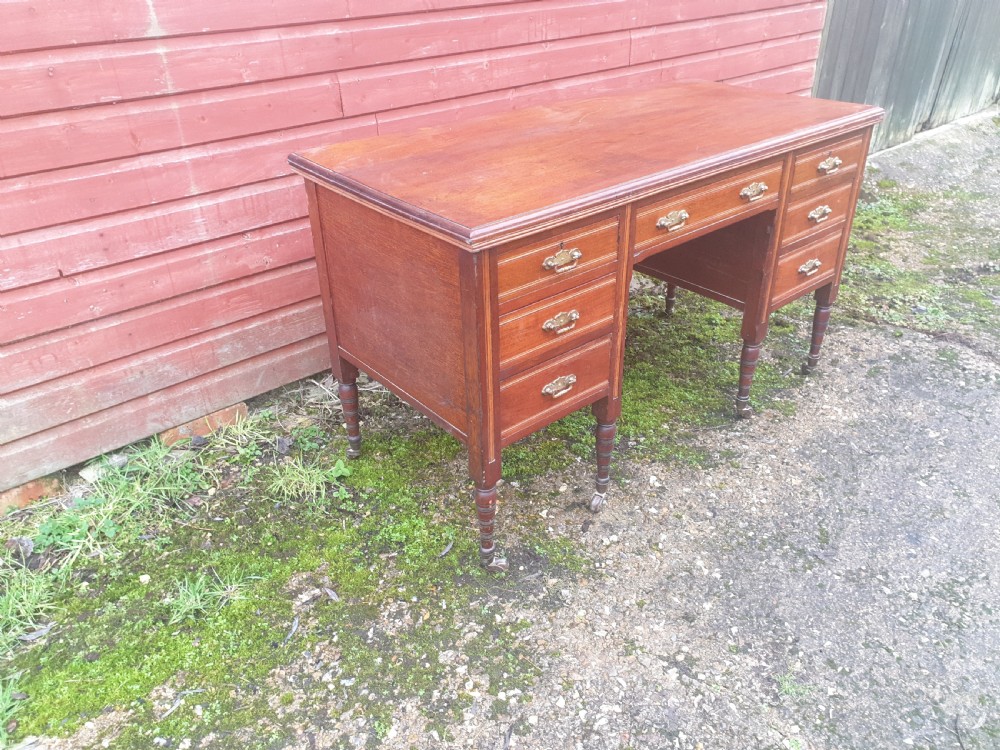 Late Victorian walnut kneehole writing desk.  View III