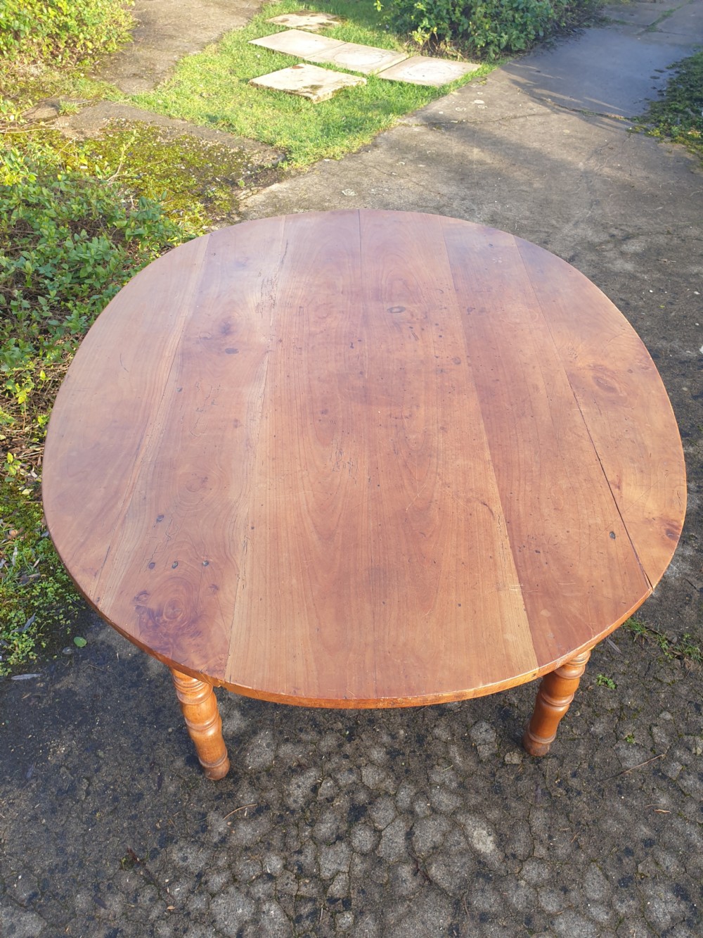 Late 19th century fruitwood oval kitchen dining table.  View V
