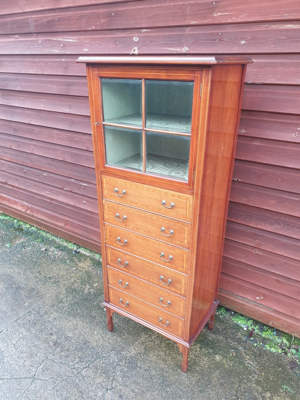 Edwardian inlaid mahogany music cabinet.
