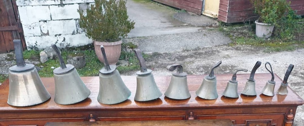Set of Victorian hand bells with inscription. 