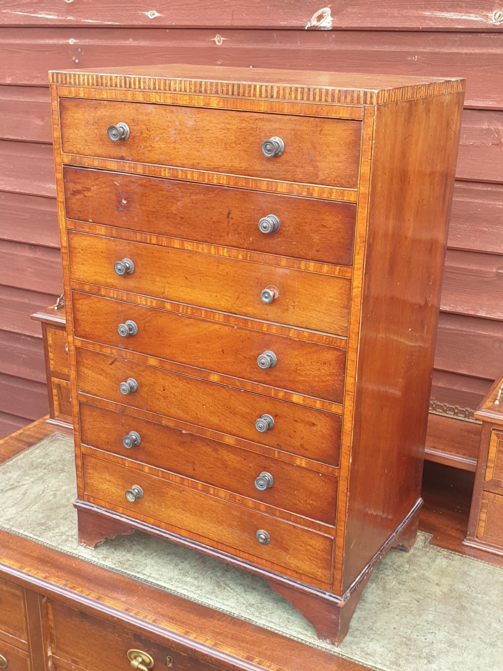 Small inlaid mahogany collectors chest. View II